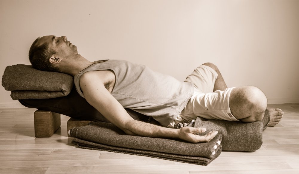 Supine Bound Angle Pose (Supta Baddha Konasana): Instructions & Photos •  Yoga Basics