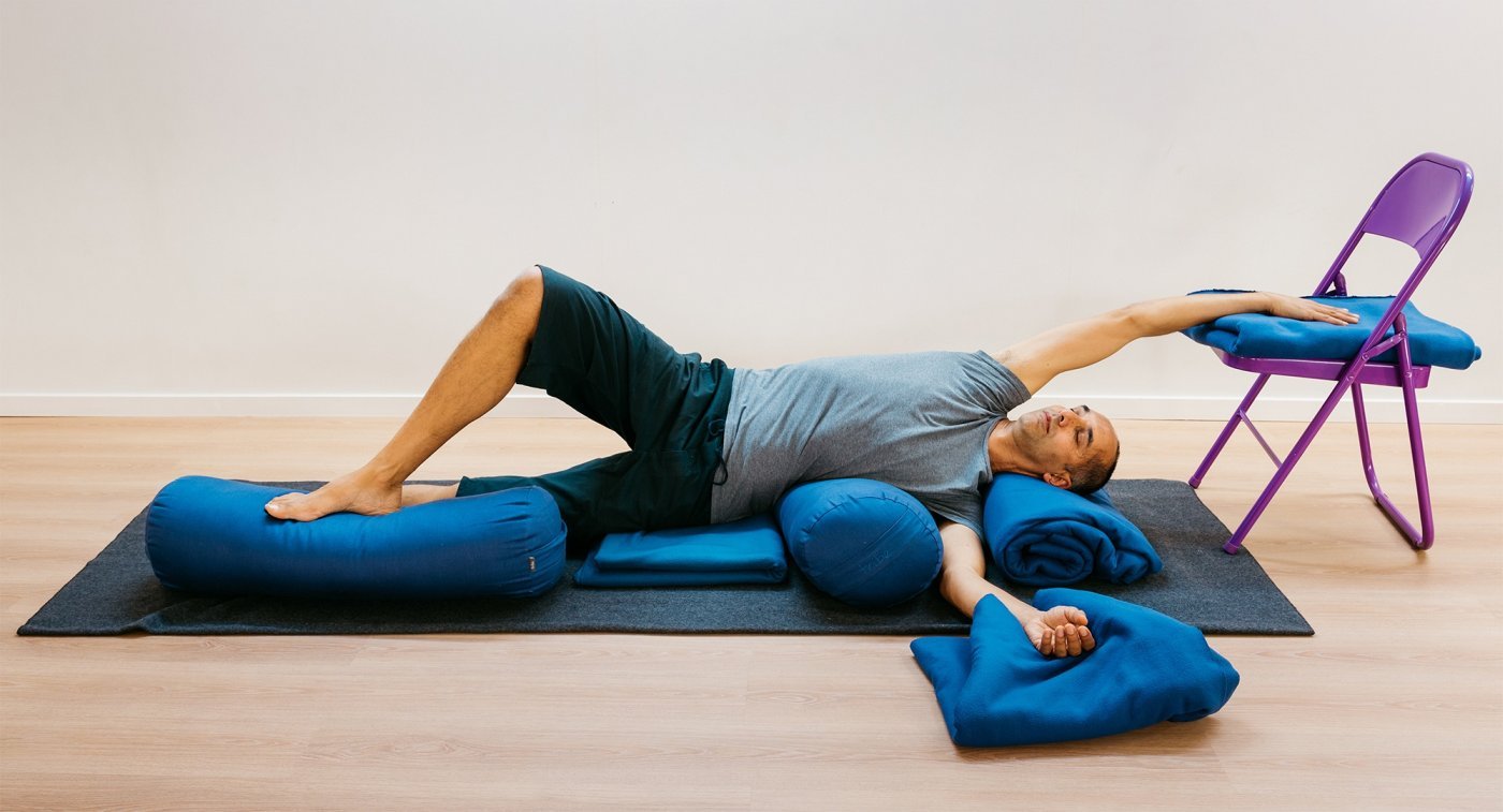 Restorative Yoga: Breathe Easier in Supported Side-Lying Stretch Pose -  YogaUOnline